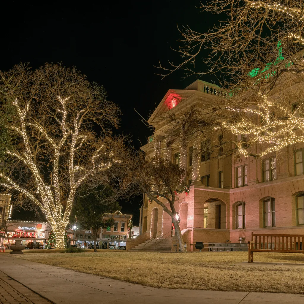 Downtown Georgetown courthouse at night during Christmas